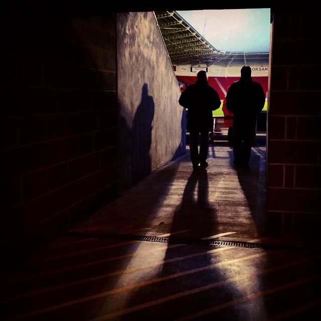 Fans head into the Keepmoat stadium for the second half of Doncaster Rovers versus Gillingham