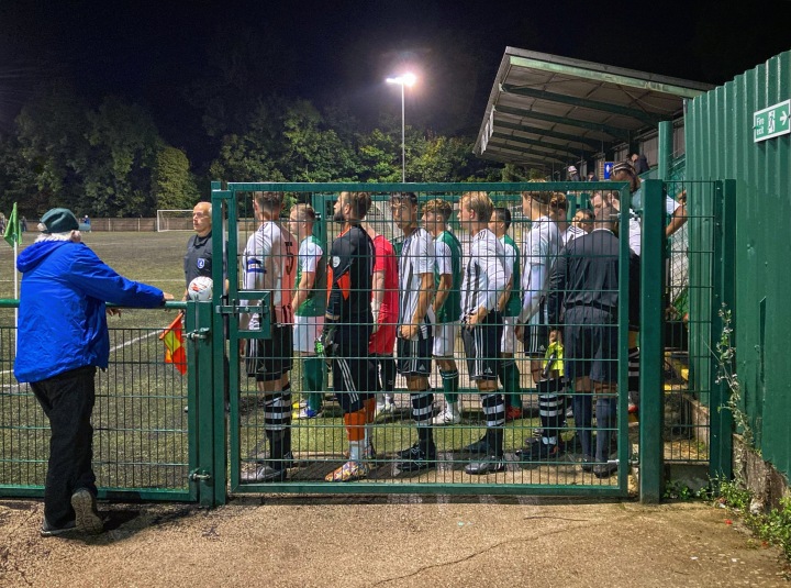 The players of Whyteleafe and Tooting Bec line up ready to go out onto the pitch